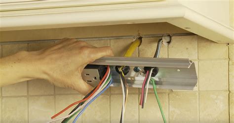 how to access junction box behind cabinets|under cabinet mounted electrical outlets.